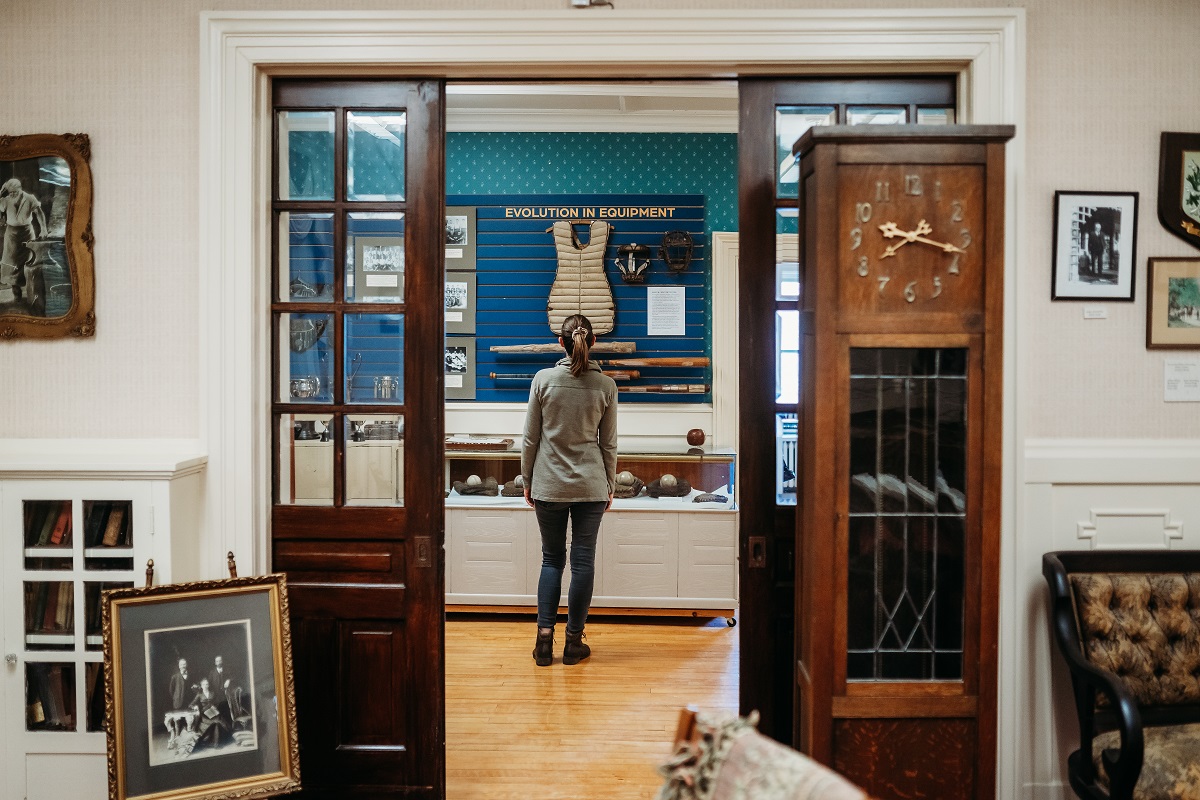 visitor views artifacts from Beachville museum first baseball game ever