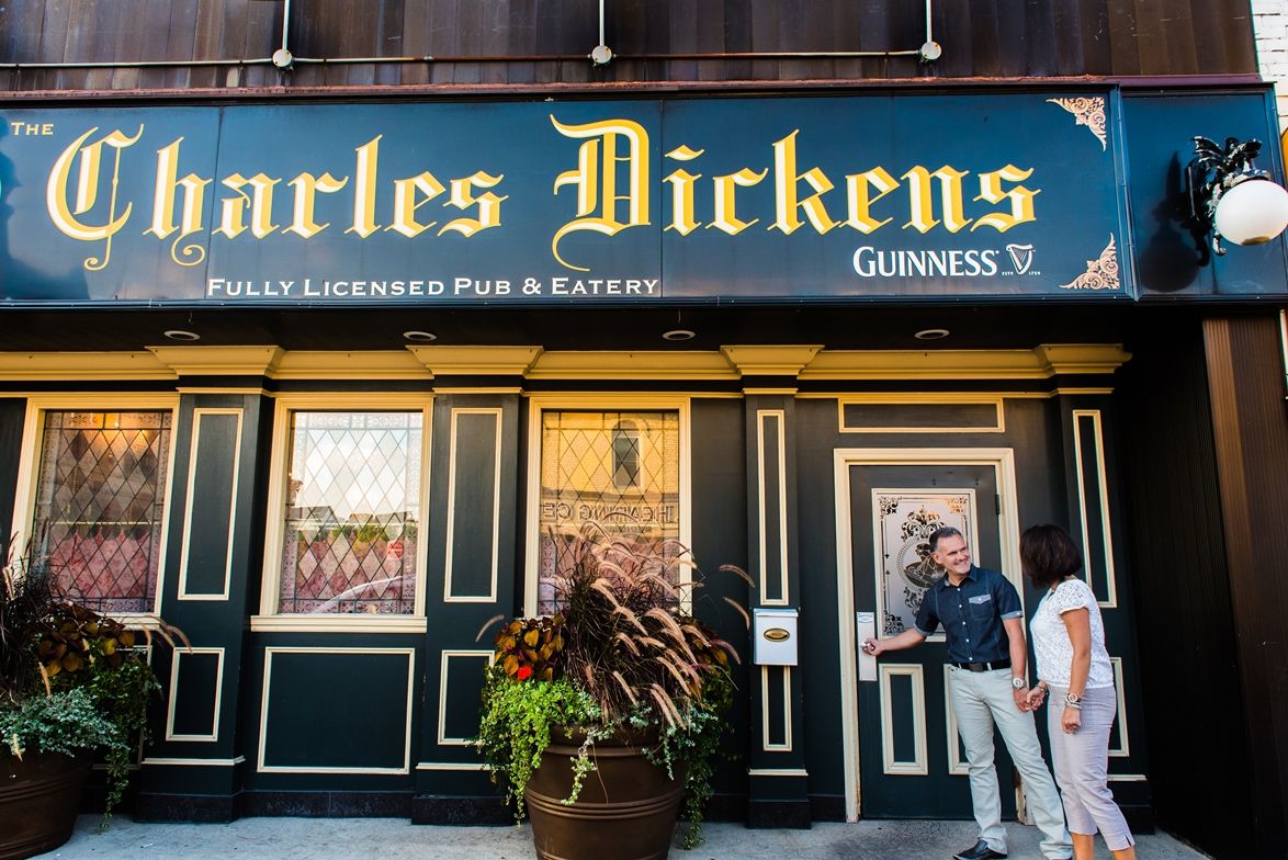 couple going into Charles dickens pub