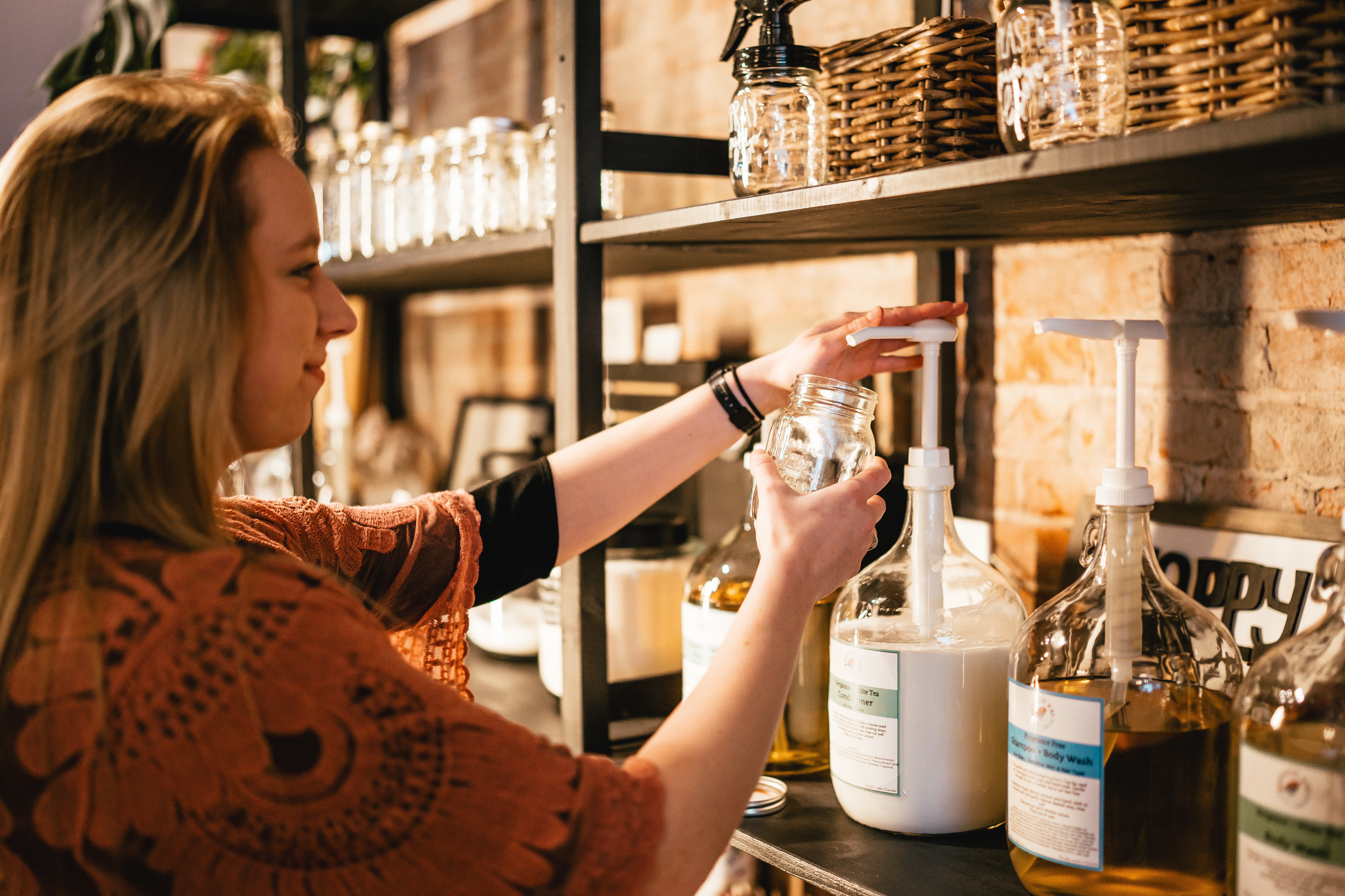 woman shopping refillable products at betty