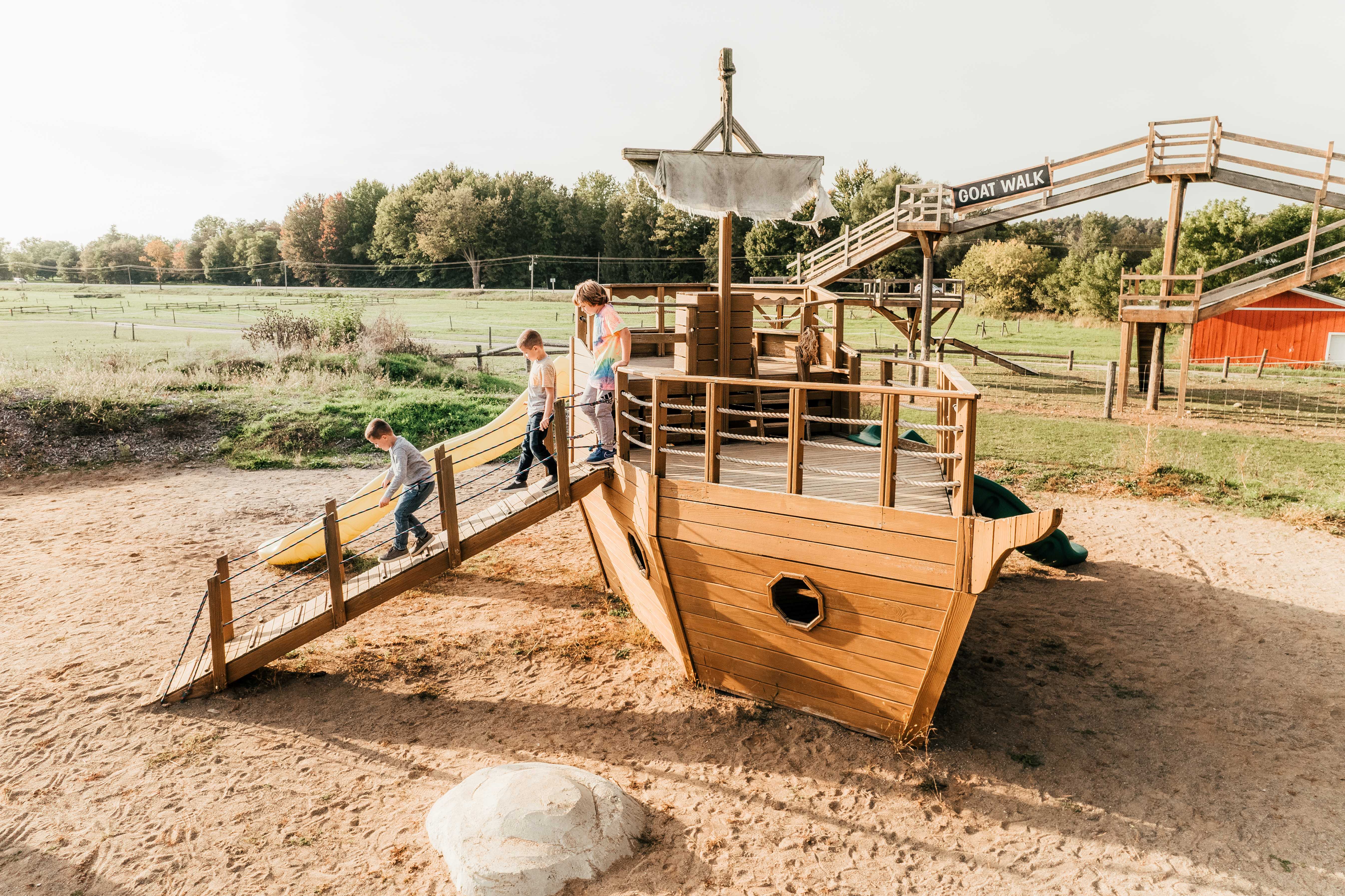 Kids play on the play equipment at Snyder