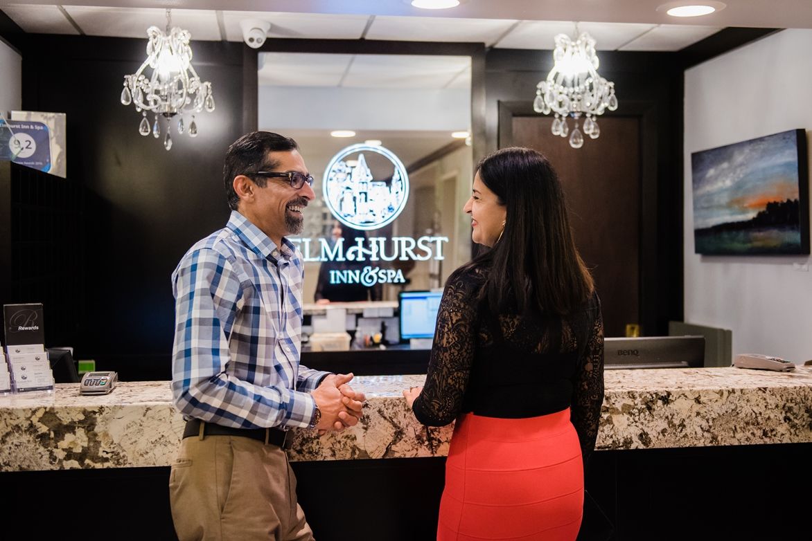 Elm Hurst couple at desk