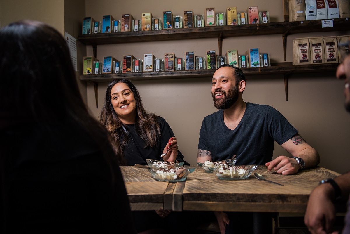 Couple eating chocolate at Habitual Chocolate