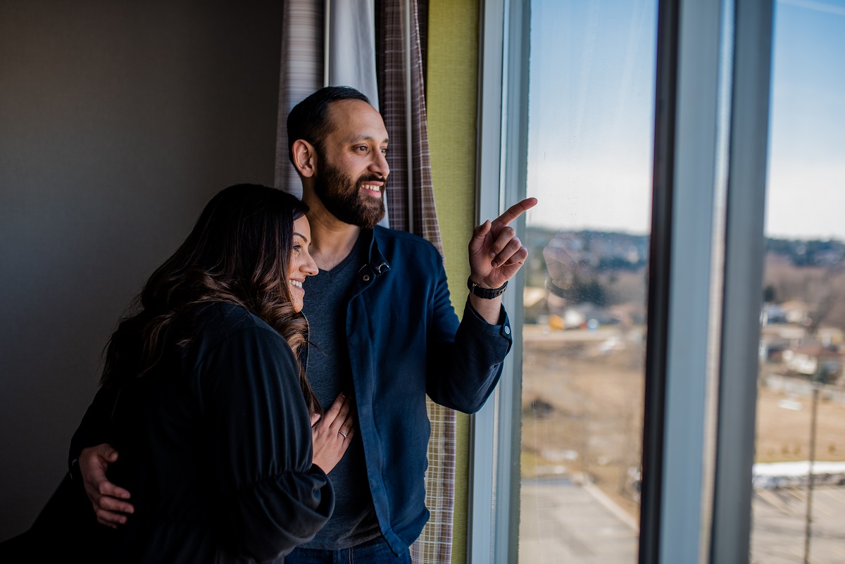 holiday inn couple looking out the window