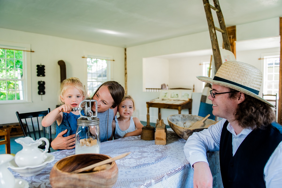 churning butter at the Norwich museum