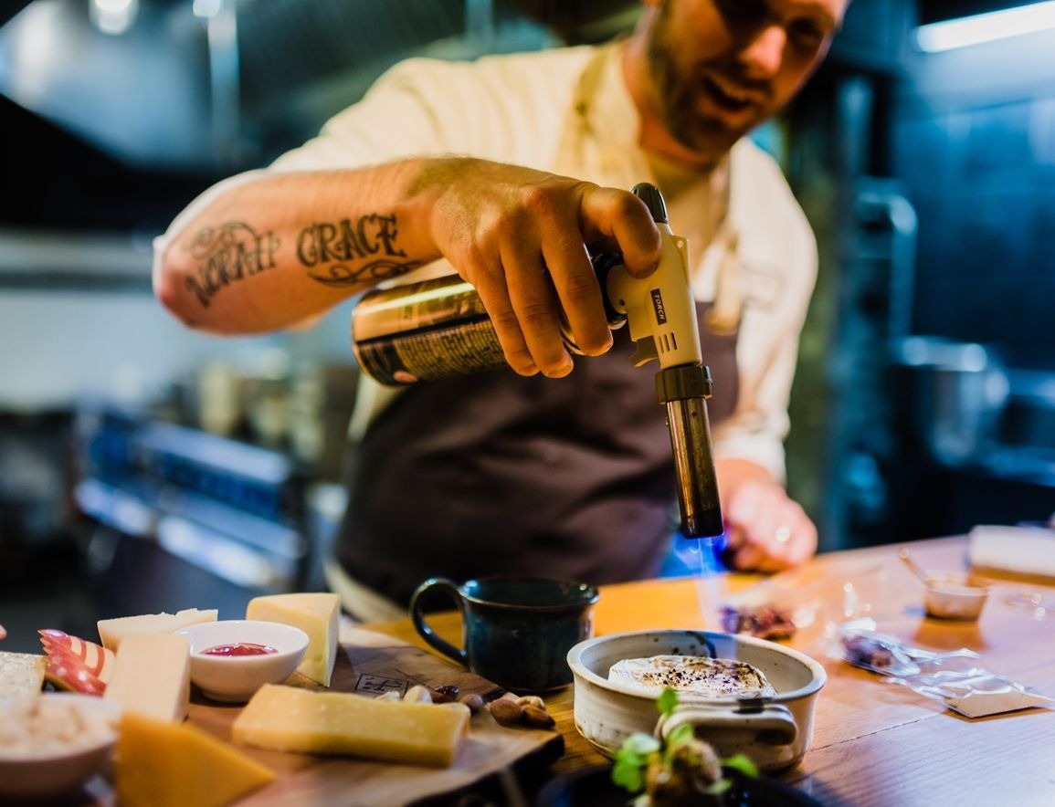 Eric using brulee torch at Chef