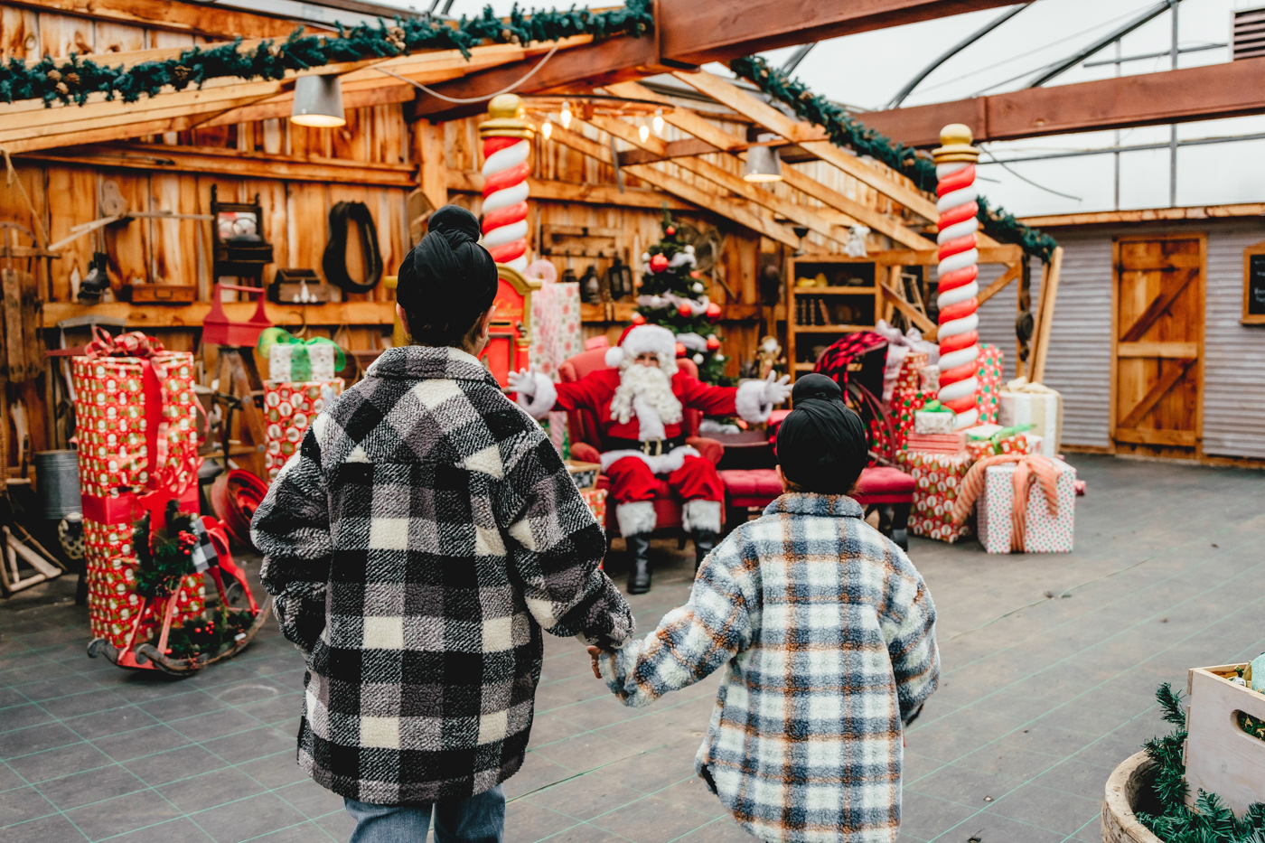 kids meeting santa in the gift barn at Snyders