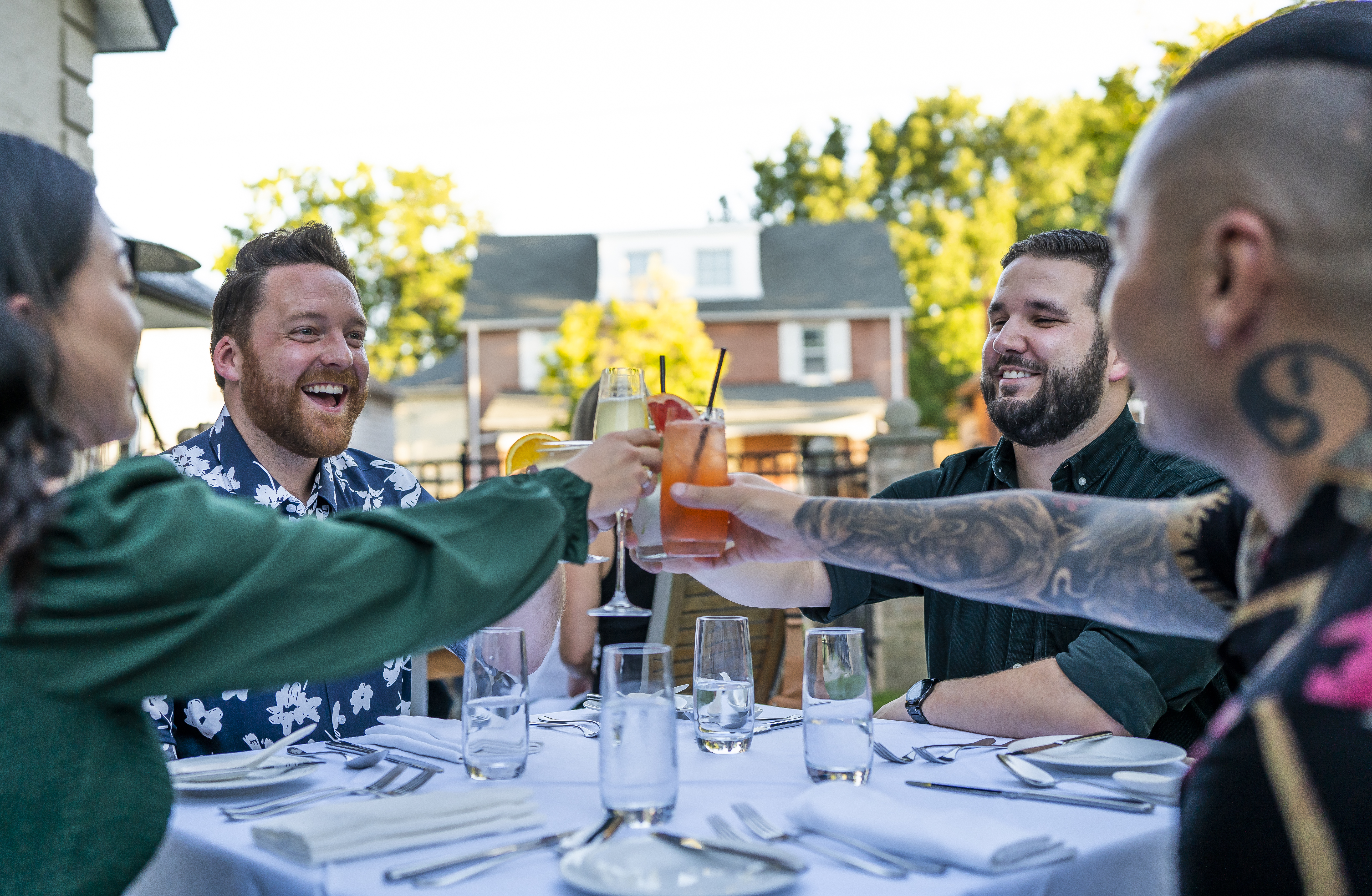 couples cheers on sixthirtynine patio