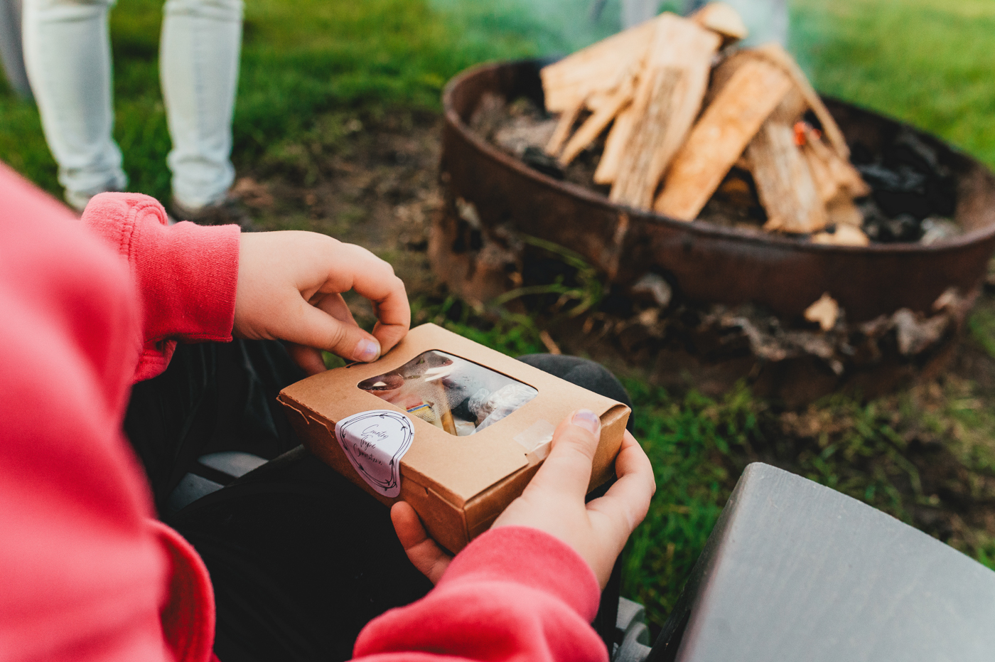 Transitions Experience wrap up with charcuterie around the fire