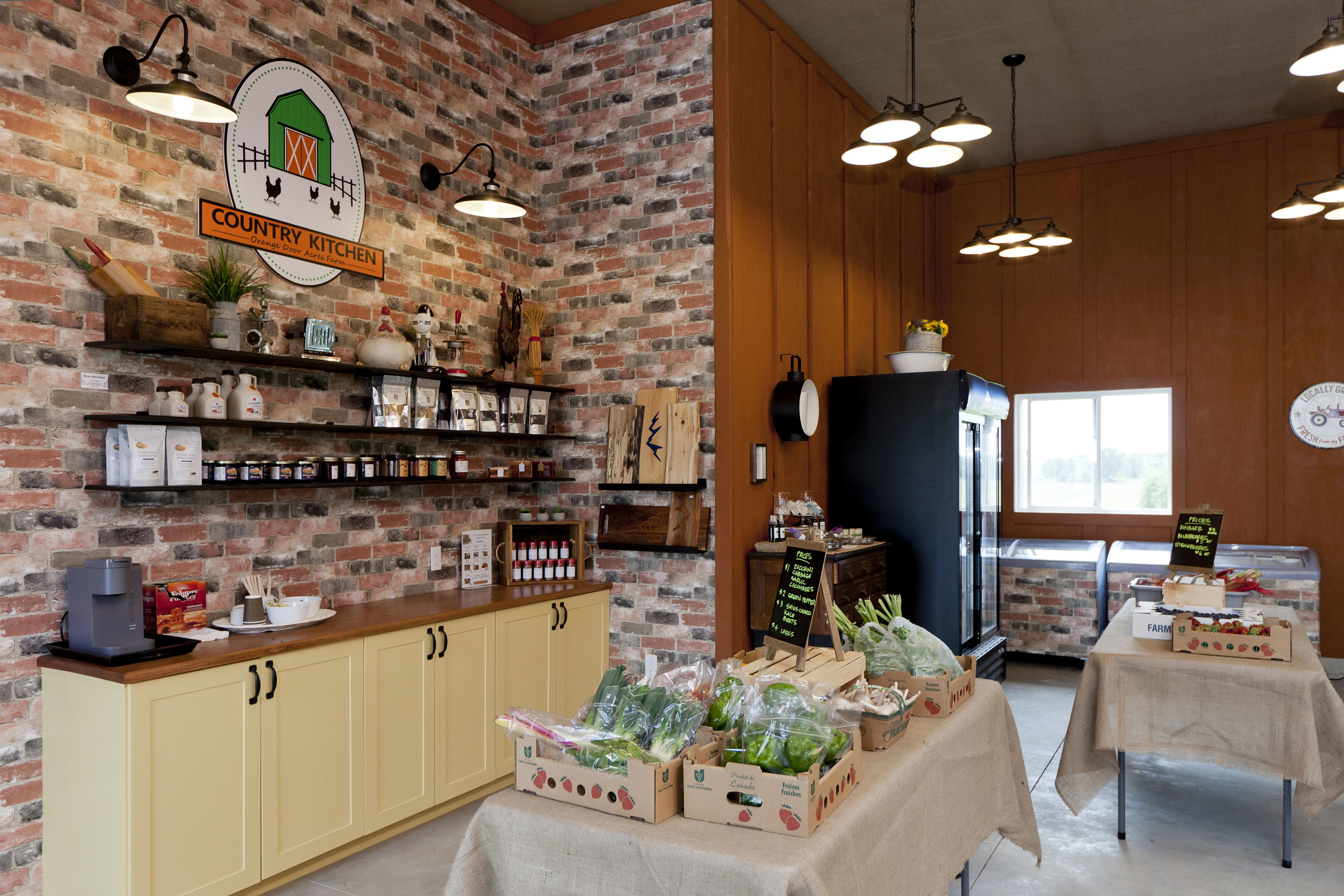 orange door acres shop interior with produce and freezers