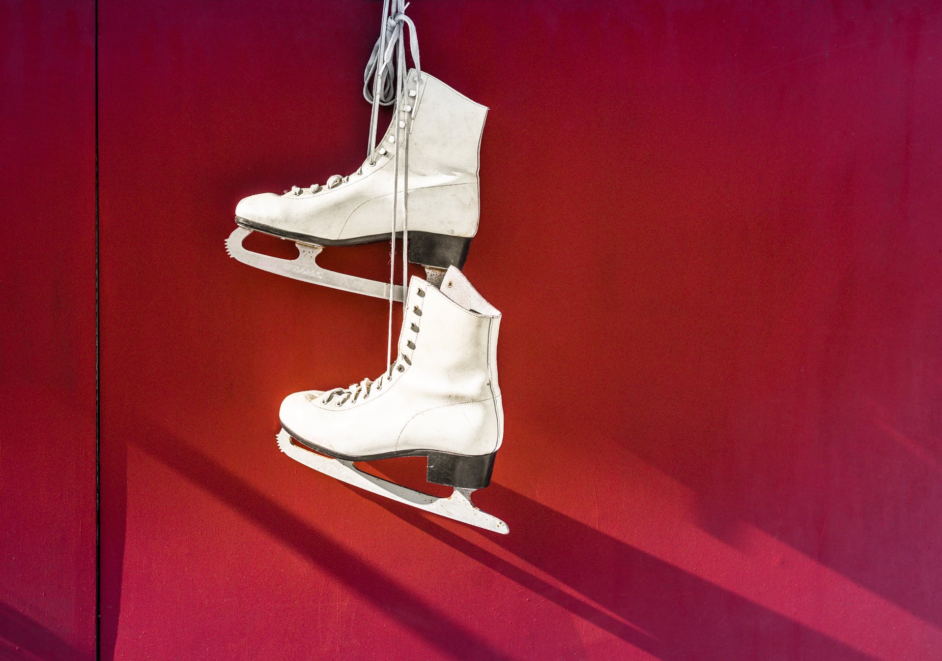 figure skates hanging up